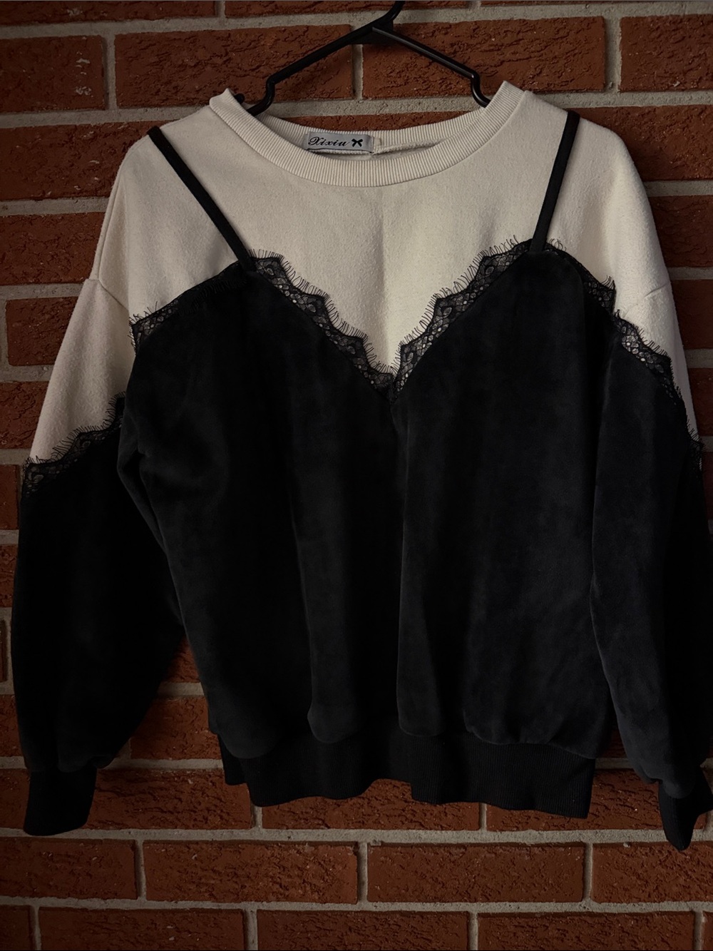 Dizzy Two-Tone Black and Cream Lace-Trim Crewneck Sweater